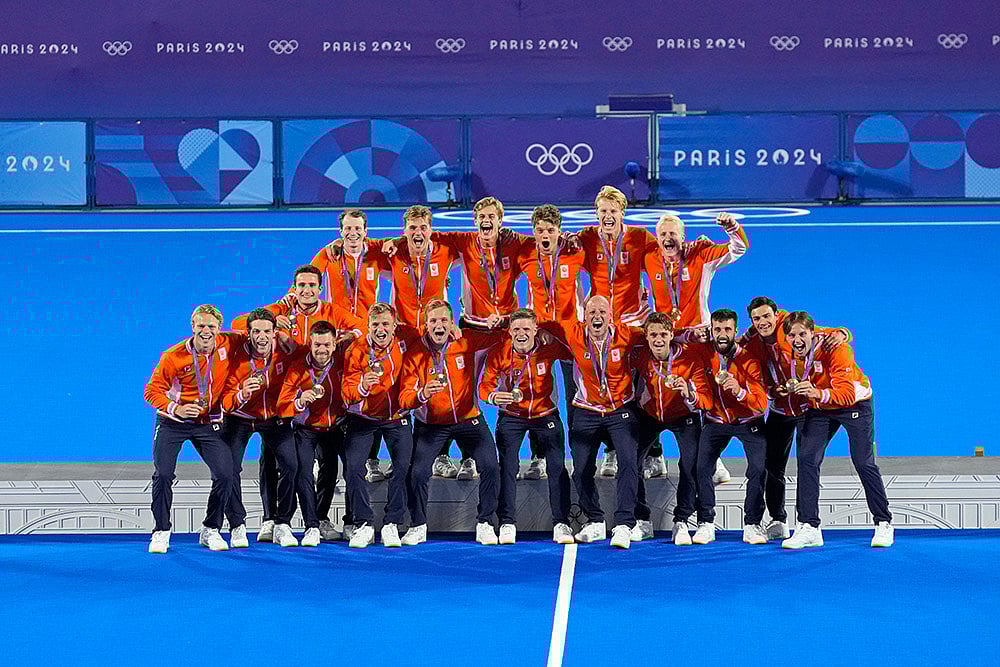 | Photo: AP/Aijaz Rahi : Men's field hockey gold medal winners of Netherlands